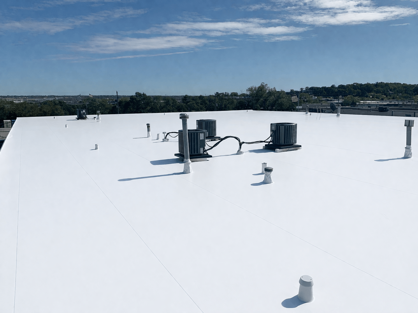 Silicone Roof Coating Systems - Fluid-Applied Recover for San Antonio's UV-Intense Climate